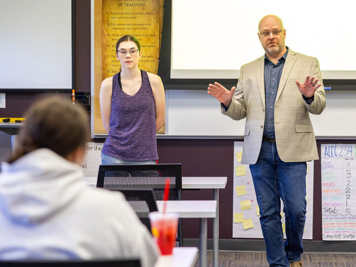 Professor speaking in an ALEC classroom.