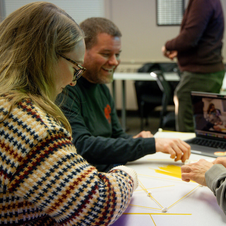 graduate students doing classroom activity