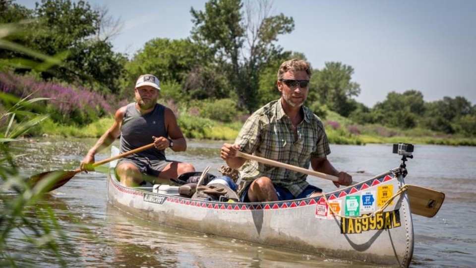 Mike Forsberg and Pete Stegen canoe down the Platte River during filming of the 'Follow the Water' documentary.